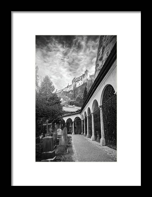 Salzburg Framed Print featuring the photograph Petersfriedhof and Salzburg Castle Black and White by Carol Japp