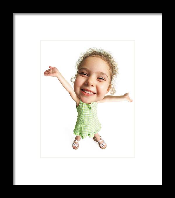 Toddler Framed Print featuring the photograph Photo Caricature From A Birdseye View Of A Cute Curly Haired Girl Smiling And Extending Her Hands Upward In A Ta-da Motion by Photodisc