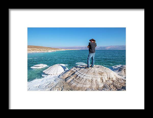 The Dead Sea Framed Print featuring the photograph Photographer at the Dead Sea by Dubi Roman