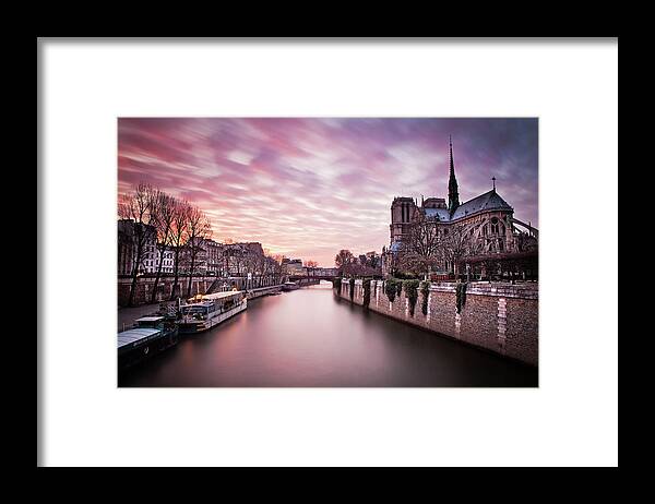 Ile De La Cite Framed Print featuring the photograph Pink Sunset of Notre Dame by Serge Ramelli