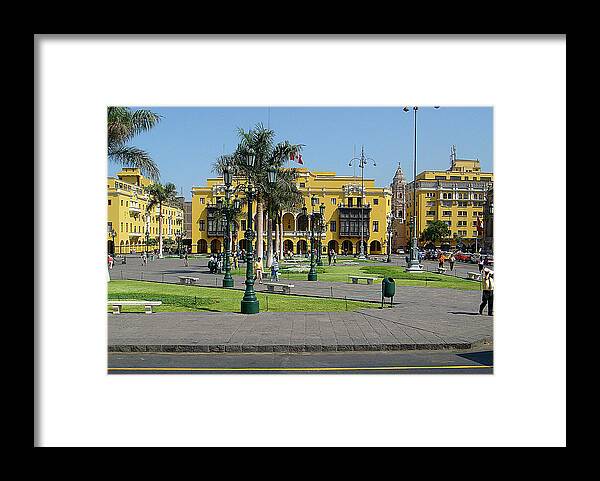 Yellow Buildings Framed Print featuring the photograph Plaza Mayor Lima Peru by Karen Zuk Rosenblatt