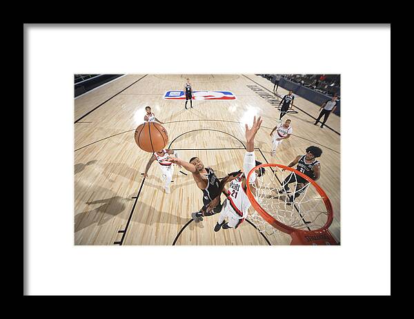 Timothe Luwawu-cabarrot Framed Print featuring the photograph Portland Trail Blazers v Brooklyn Nets by Jesse D. Garrabrant
