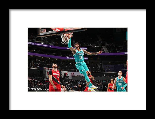Miles Bridges Framed Print featuring the photograph Portland Trail Blazers v Charlotte Hornets by Kent Smith
