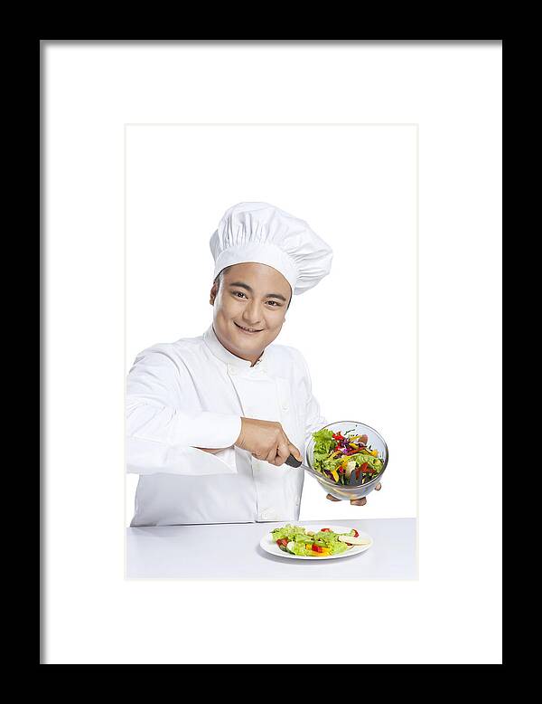Young Men Framed Print featuring the photograph Portrait of chef serving vegetables on plate by Ravi Ranjan