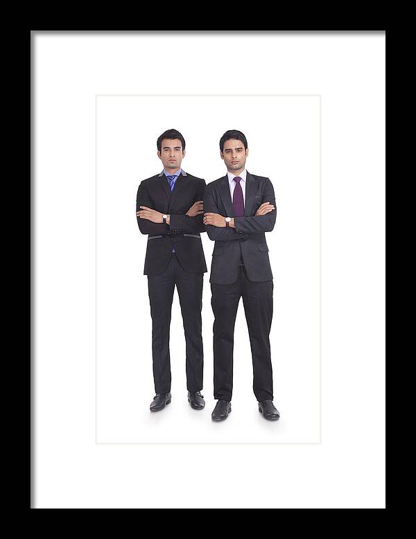 Young Men Framed Print featuring the photograph Portrait of two businessmen by Sudipta Halder