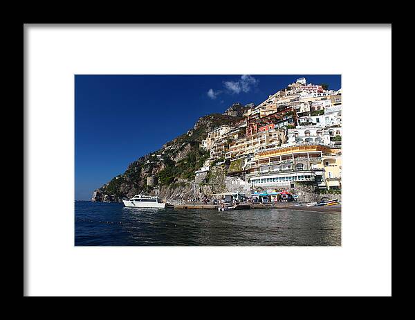 Water's Edge Framed Print featuring the photograph Positano waterfront. The Amalfi Coast, Campania, Italy by Amaia Arozena & Gotzon Iraola