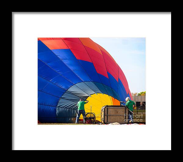 Hot Air Balloons Framed Print featuring the photograph Preparing the Balloon for the Up Up And Away Florida Hot Air Ballon Festival by L Bosco
