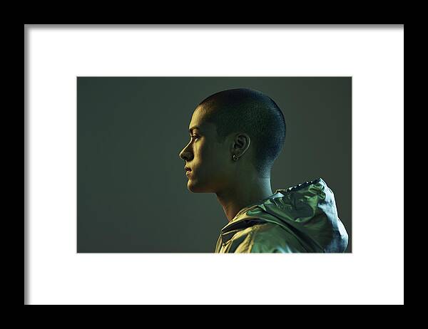 Cool Attitude Framed Print featuring the photograph Profile shot of beautiful young man, shot on studio by Klaus Vedfelt
