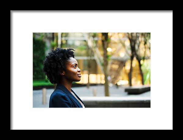Corporate Business Framed Print featuring the photograph Profile shot of woman looking ahead by Tim Robberts