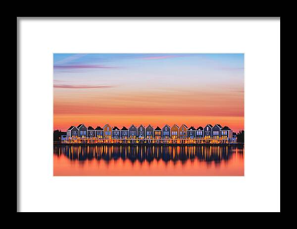  Framed Print featuring the photograph Rainbow houses during sunset by Patrick Van Os