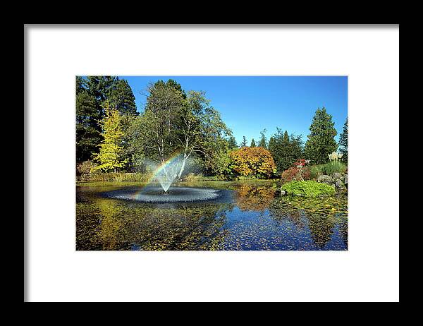 Alex Lyubar Framed Print featuring the photograph Rainbow in the fountain by Alex Lyubar