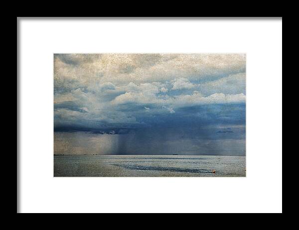 Sea Framed Print featuring the photograph Rainy day by Yasmina Baggili