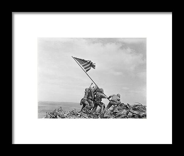 Iwo Jima Framed Print featuring the photograph Raising the Flag on Iwo Jima - WW2 - 1945 by War Is Hell Store