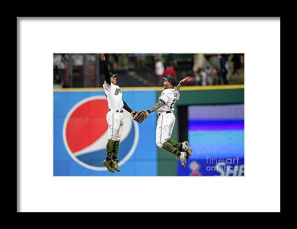 People Framed Print featuring the photograph Rajai Davis and Francisco Lindor by Jason Miller