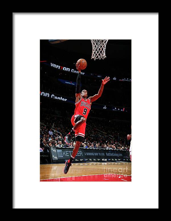 Nba Pro Basketball Framed Print featuring the photograph Rajon Rondo by Ned Dishman