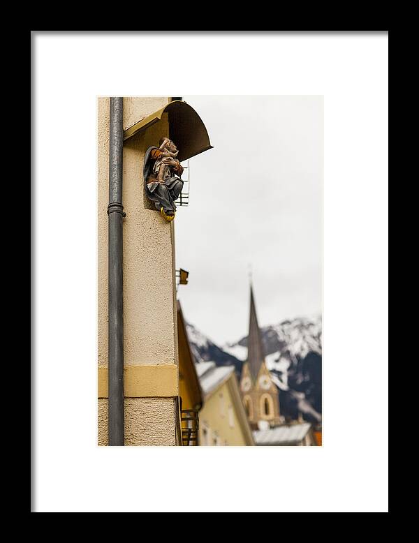 Snow Framed Print featuring the photograph Religious sculptures on street corners by Merten Snijders