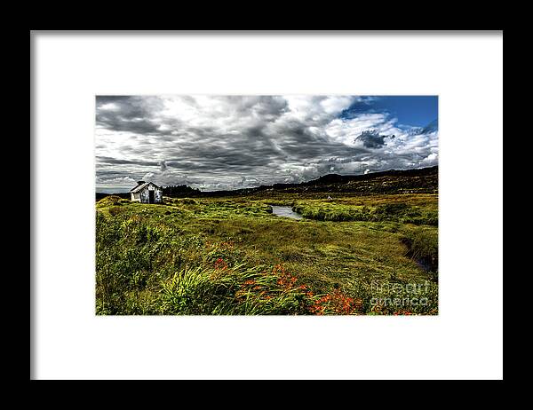 Ireland Framed Print featuring the photograph Remote Hut Beneath River in Ireland by Andreas Berthold