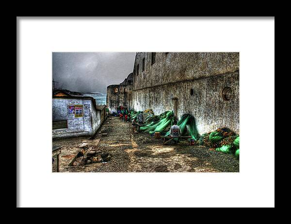  Net Framed Print featuring the photograph Repairing Nets at Cape Coast Castle by Wayne King