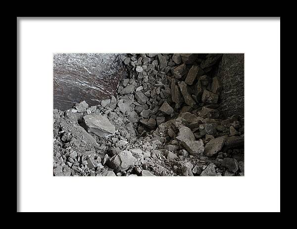 Material Framed Print featuring the photograph Rocks pass along the production line before being used to make cement by Bloomberg Creative Photos