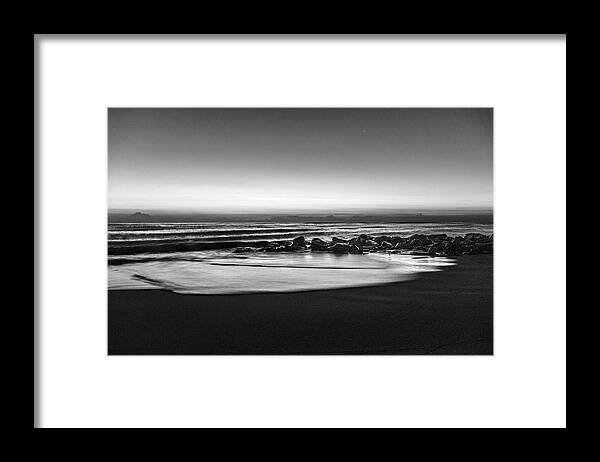 Birds Framed Print featuring the photograph Rocky Beach at Dawn Black and White by Debra and Dave Vanderlaan