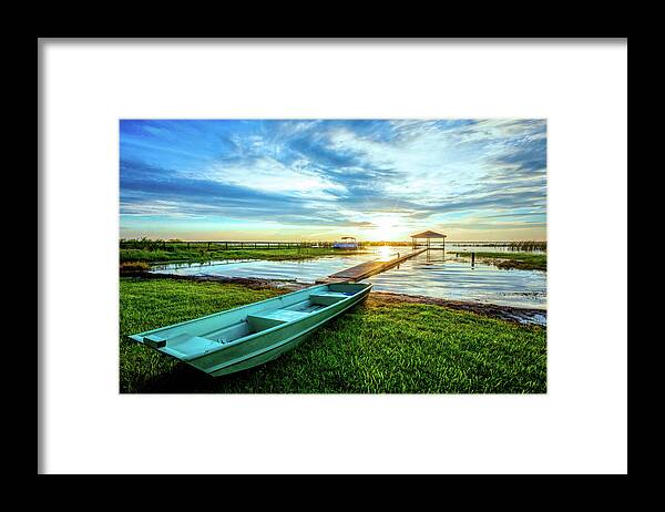 Docks Framed Print featuring the photograph Rowboat at the Water's Edge by Debra and Dave Vanderlaan