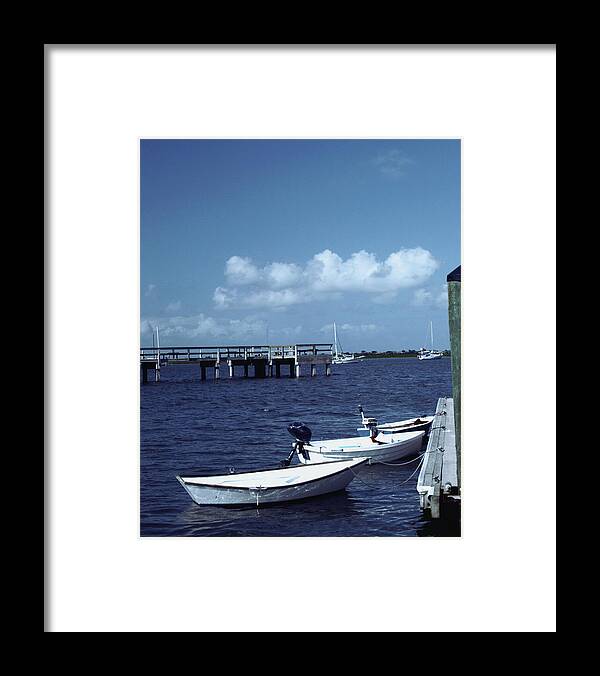 Rowboats Tied To Dock Photo Framed Print featuring the photograph Rowboats Tied to Dock by Bob Pardue