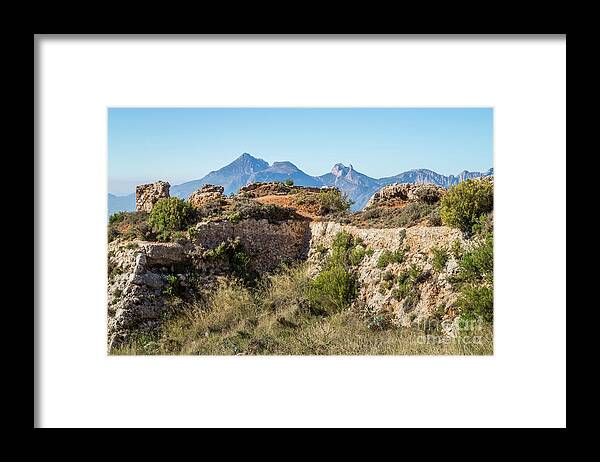 Fortress Framed Print featuring the photograph Ruins of an ancient fortress in the mountains by Adriana Mueller