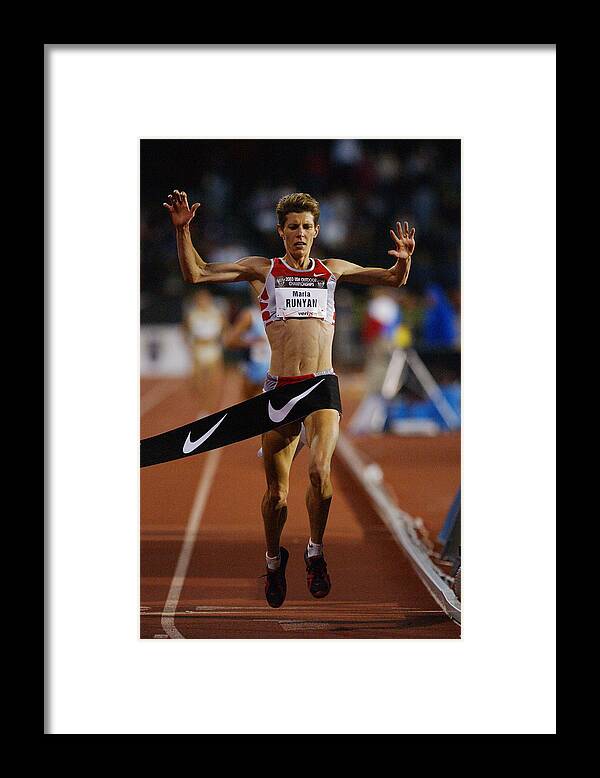 Finish Line Framed Print featuring the photograph Runyan wins 5000 final by Matthew Stockman
