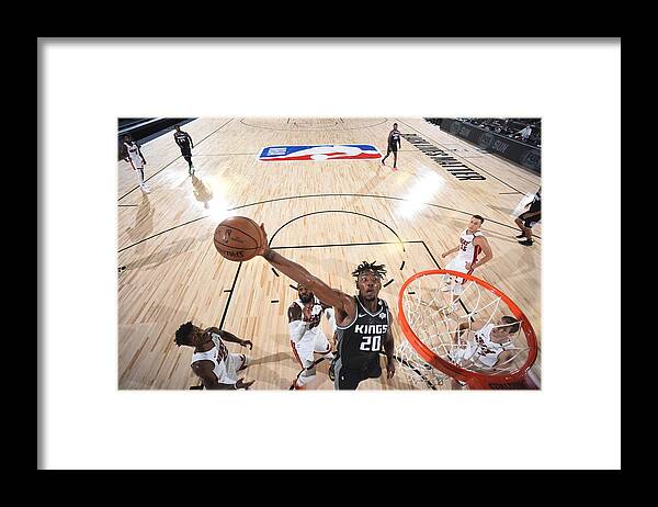 Nba Pro Basketball Framed Print featuring the photograph Sacramento Kings v Miami Heat by Garrett Ellwood