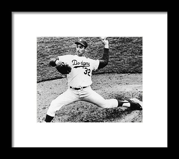 Sandy Koufax Framed Print featuring the photograph Sandy Koufax by American Stock Archive