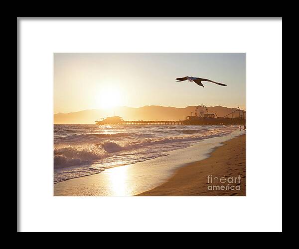 Santa Monica Framed Print featuring the photograph Santa Monica beach at sunset. Southern California by Stella Levi