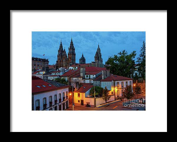 Way Framed Print featuring the photograph Santiago de Compostela Cathedral Spectacular View by Night Dusk with Street Lights and Tiled Roofs La Corua Galicia by Pablo Avanzini