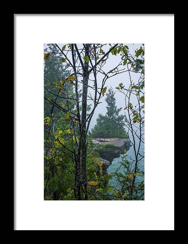 Cave Point Framed Print featuring the photograph Sentinel Cedar at Cave Point and a droplet-bedazzled Spiderweb - Door County Wisconsin by Peter Herman
