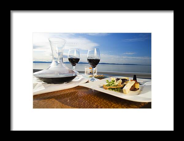 Scenics Framed Print featuring the photograph Set table with gourmet appetizer and two glasses on red wine by Twohumans