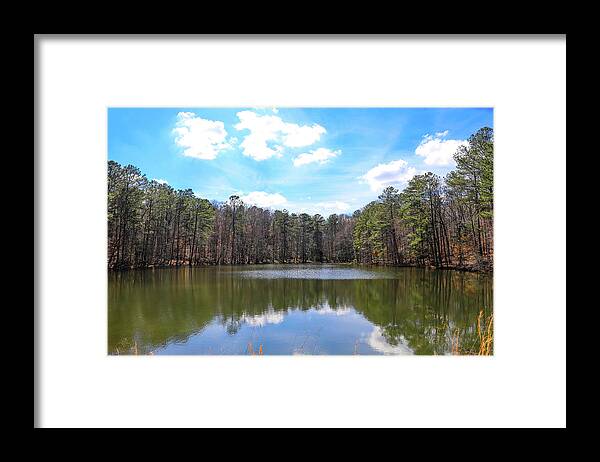 Lake Framed Print featuring the photograph Silky Clouds Over Blue Sky at Sibley Pond by Marcus Jones