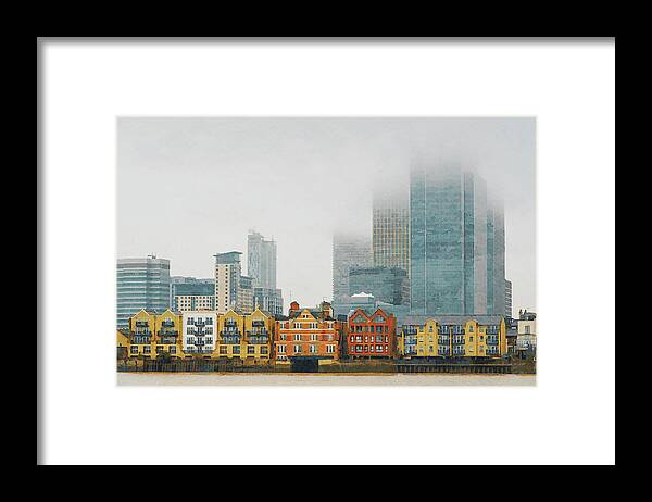 Canary Wharf Framed Print featuring the photograph Skyline of Canary Wharf business centre at mist. London UK by Michalakis Ppalis