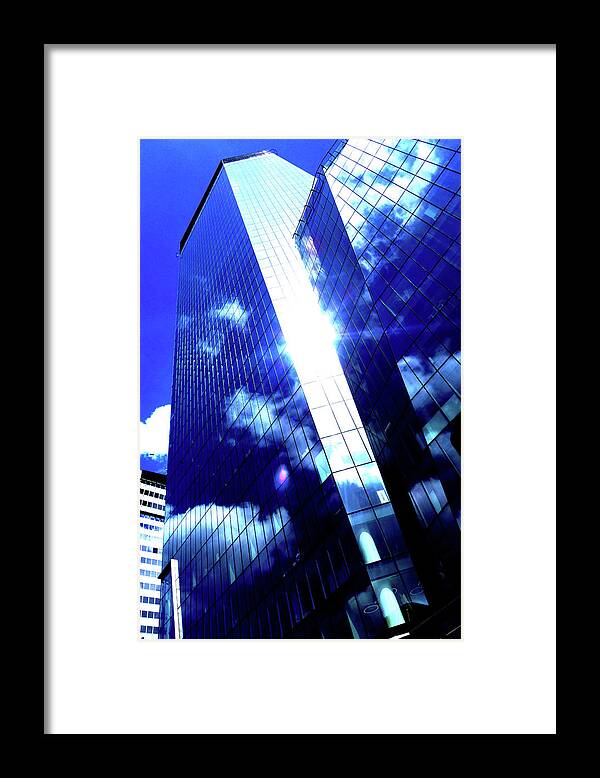 Skyscraper Framed Print featuring the photograph Skyscrapers In Clouds In Warsaw, Poland by John Siest