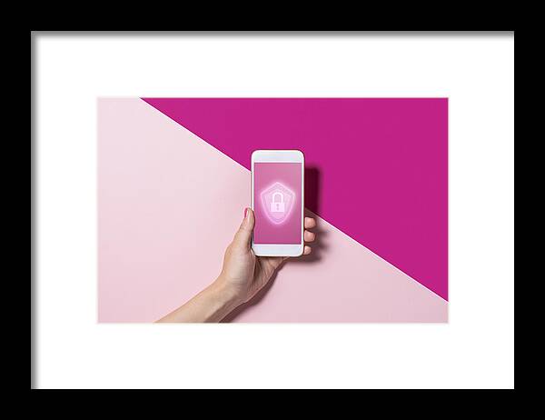 Shadow Framed Print featuring the photograph Smart phone with the security key lock icon by Yagi Studio