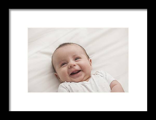 People Framed Print featuring the photograph Smiling Newborn by Jose Luis Pelaez