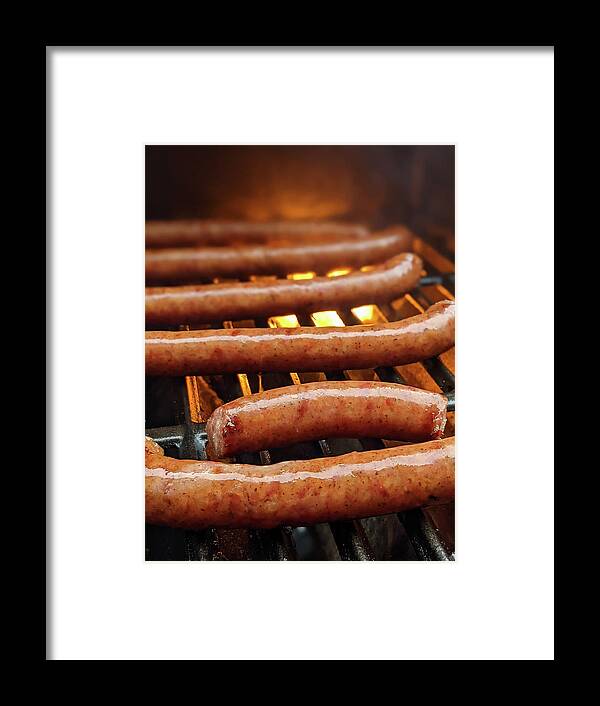 Asada Framed Print featuring the photograph Smoked Southern Sausages On A Grille Ready To Eat by Alex Grichenko