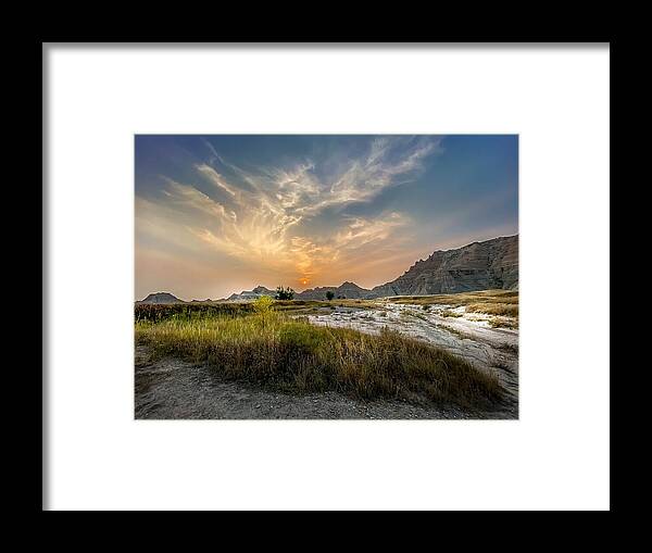 National Park Framed Print featuring the photograph Smoky Sunset at Badlands by Susan Rydberg