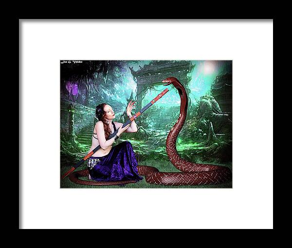  Sorceress Framed Print featuring the photograph Snake Charmer by Jon Volden
