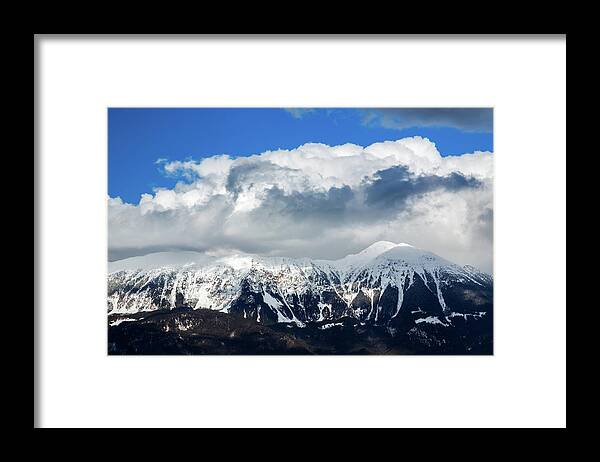 Mountain Framed Print featuring the photograph Snowy mountains by Ian Middleton
