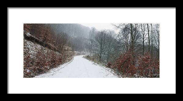 Scenics Framed Print featuring the photograph Snowy winter trail by Mavroudakis Fotis Photography