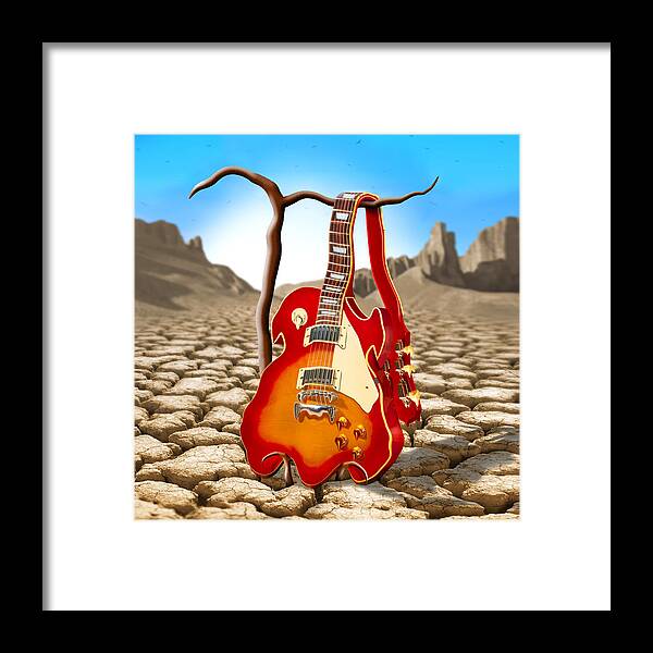 Surrealism Framed Print featuring the photograph Soft Guitar II by Mike McGlothlen