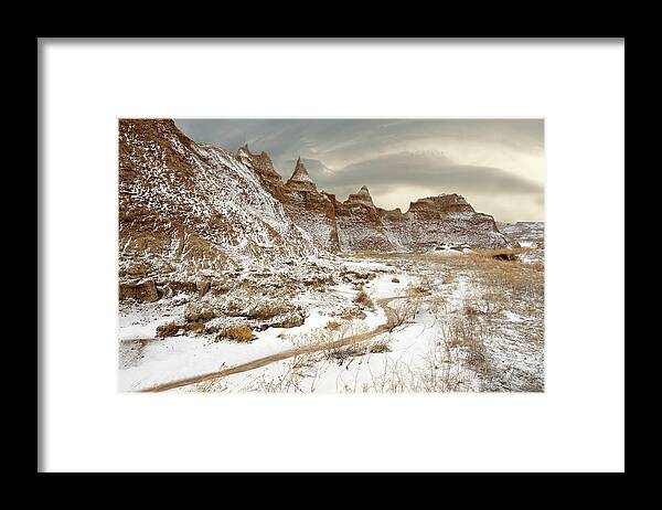 Badlands Framed Print featuring the photograph South Dakota Badlands National Park in early Spring by Peter Herman