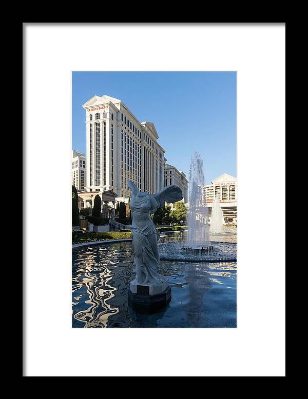 Splendiferous Fountain Framed Print featuring the photograph Splendiferous Las Vegas Fountain - Goddess Nike the Winged Victory of Samothrace by Georgia Mizuleva
