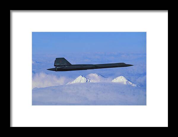 Lockheed Sr-71 Blackbird Framed Print featuring the mixed media SR-71 Blackbird Over Snowcapped Mountains by Erik Simonsen