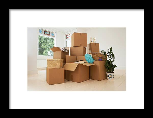 Heap Framed Print featuring the photograph Stack of Boxes in New House by Moodboard