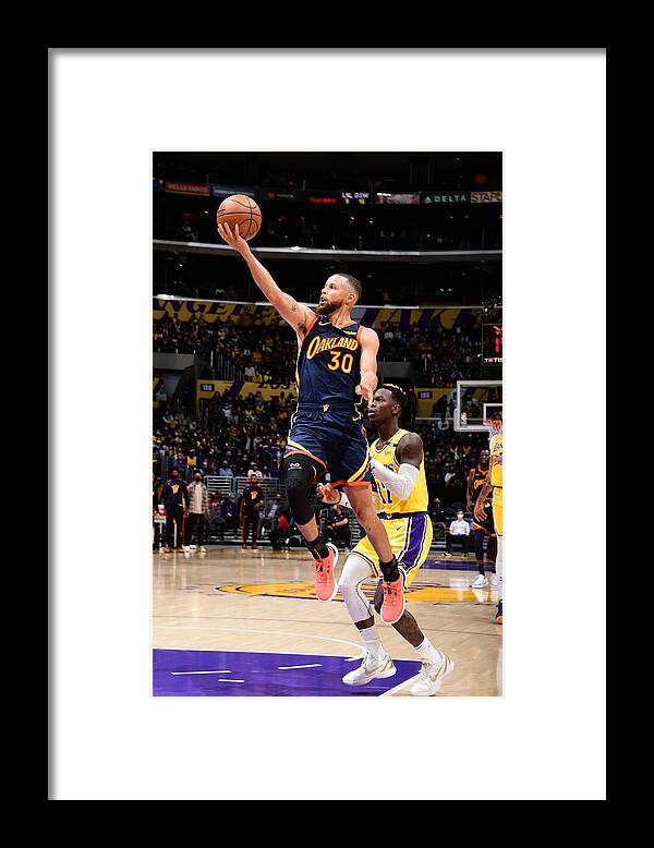 Nba Pro Basketball Framed Print featuring the photograph Stephen Curry by Adam Pantozzi